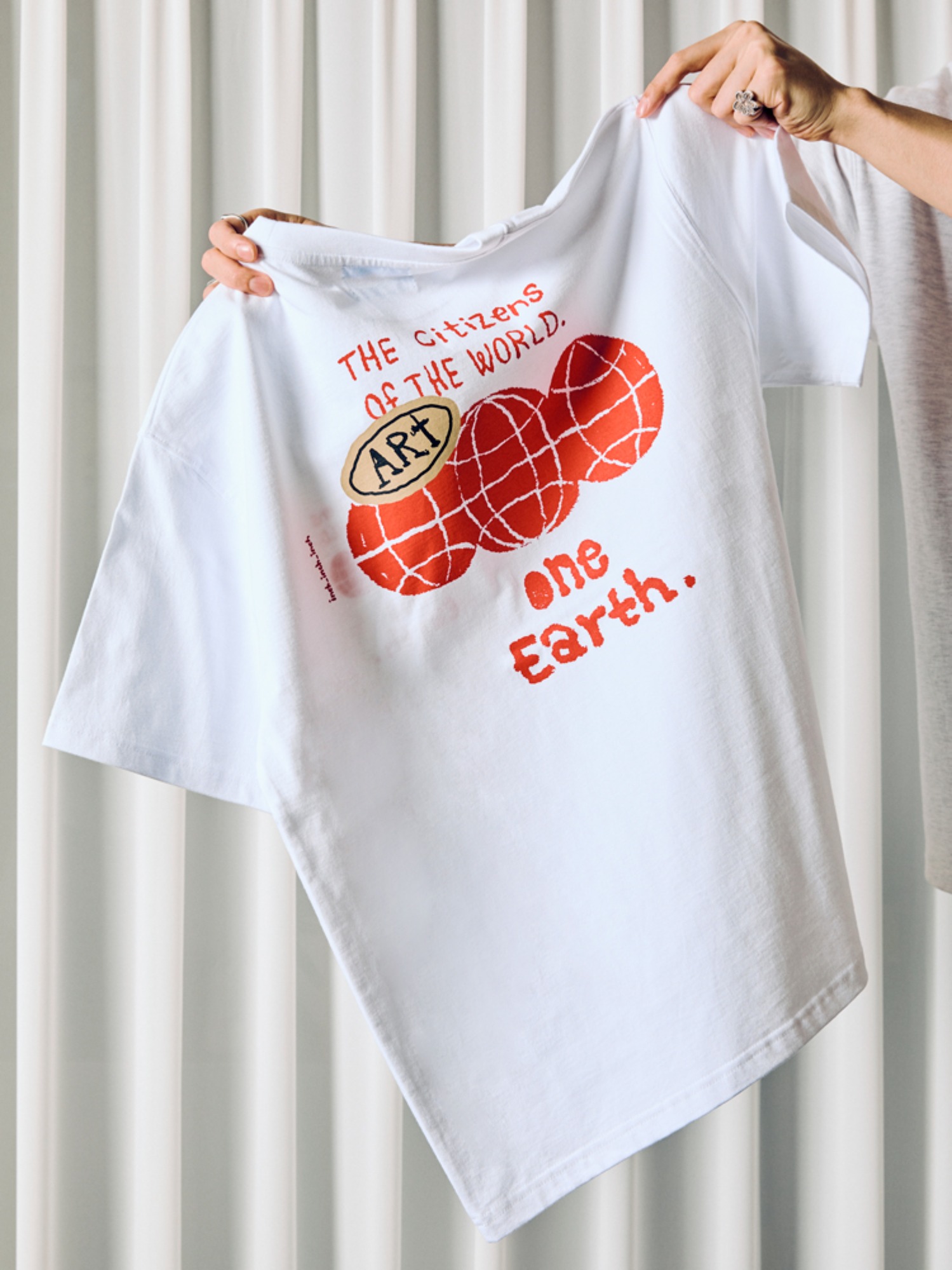 One Earth T shirts (Off White)